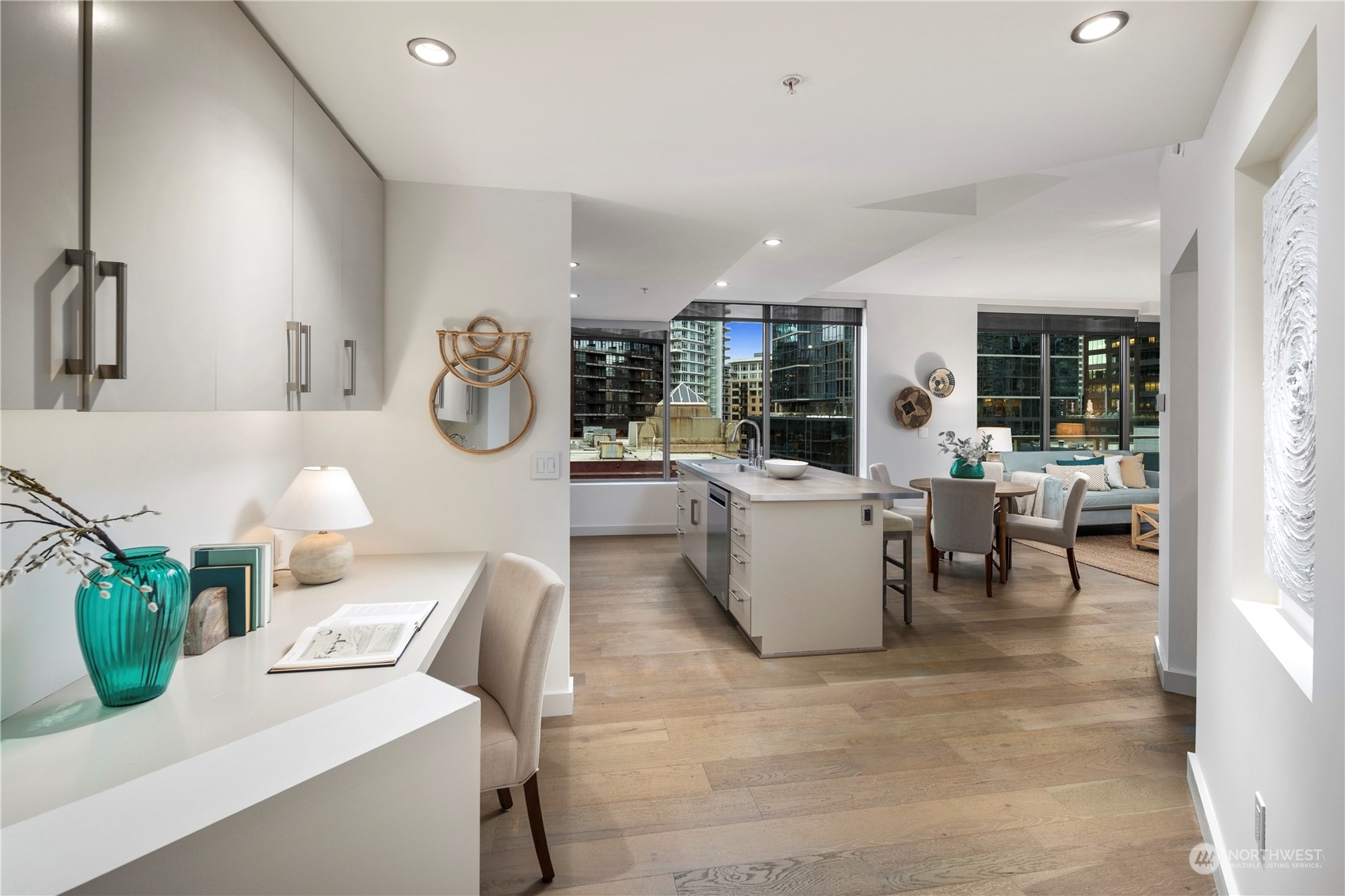 910 Lenora Street, Unit S1003 Seattle, WA 98121 - Photo 2 of 28 a living room with furniture and white table