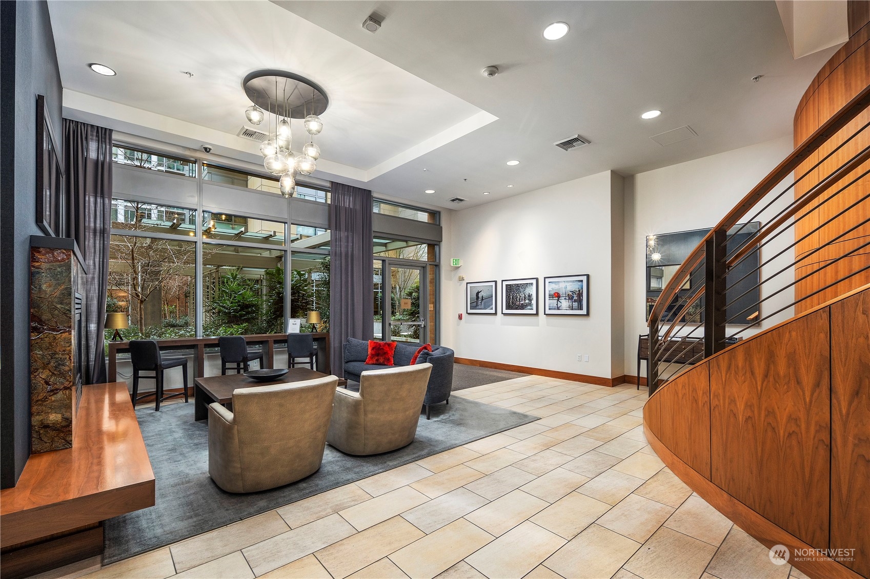 910 Lenora Street, Unit S1003 Seattle, WA 98121 - Photo 21 of 28 a living room filled with furniture and a table