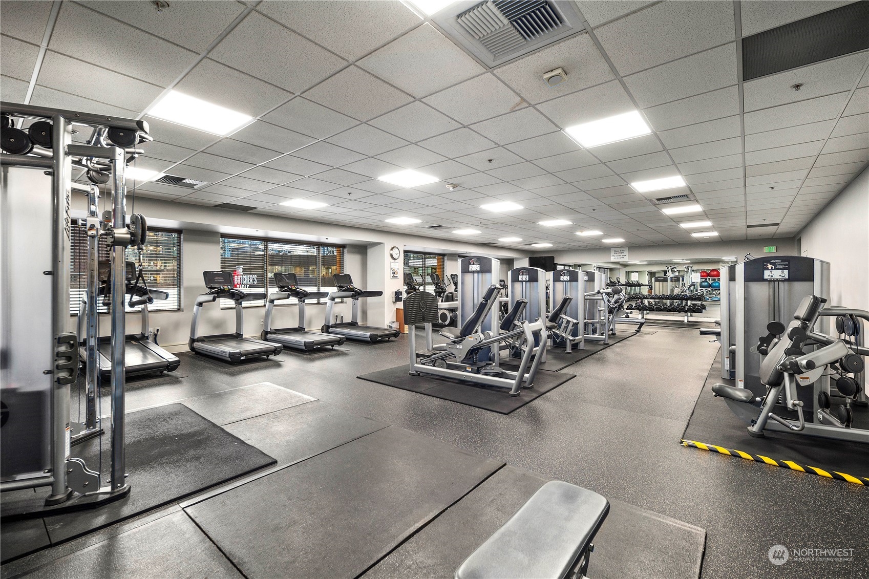 910 Lenora Street, Unit S1003 Seattle, WA 98121 - Photo 25 of 28 a view of a room with gym equipment