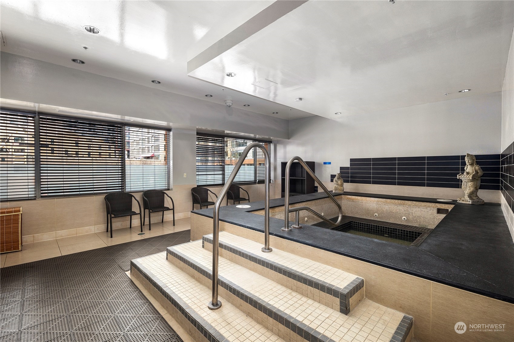 910 Lenora Street, Unit S1003 Seattle, WA 98121 - Photo 27 of 28 a view of a room with gym equipment