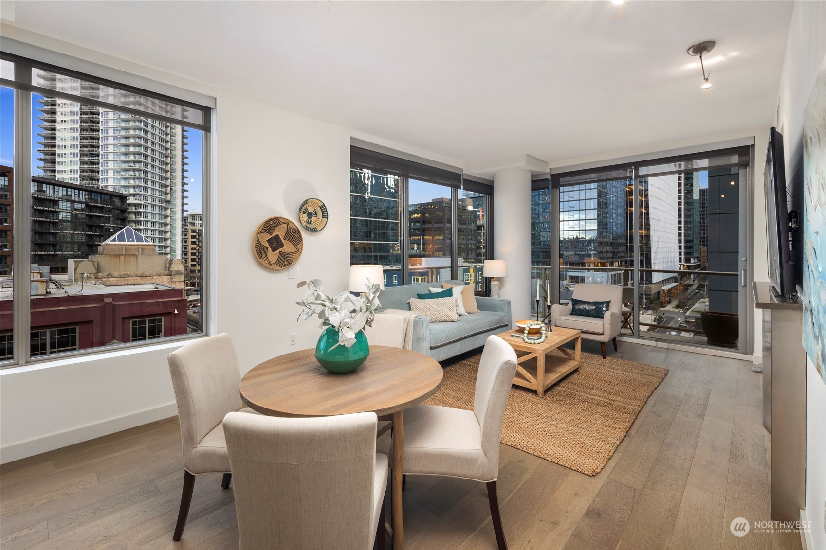 910 Lenora Street, Unit S1003 Seattle, WA 98121 - Photo 3 of 28 a view of a dining room with furniture window and outside view