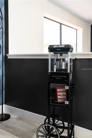 a view of balcony with wooden floor