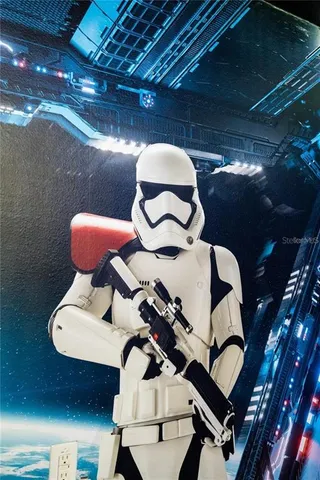 a room with furniture and wooden floor