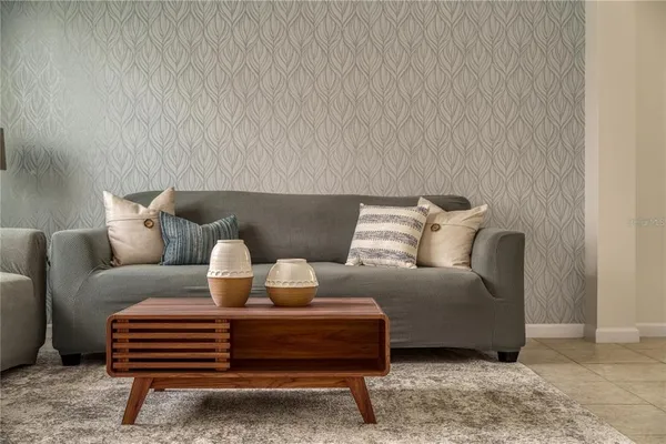 a living room with furniture and a couch