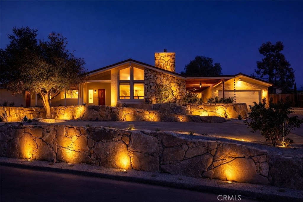 1670 Southfork Place Paso Robles, CA 93446 - Photo 2 of 61 AI generated to give you an idea what the yard could look like with evening lighting.