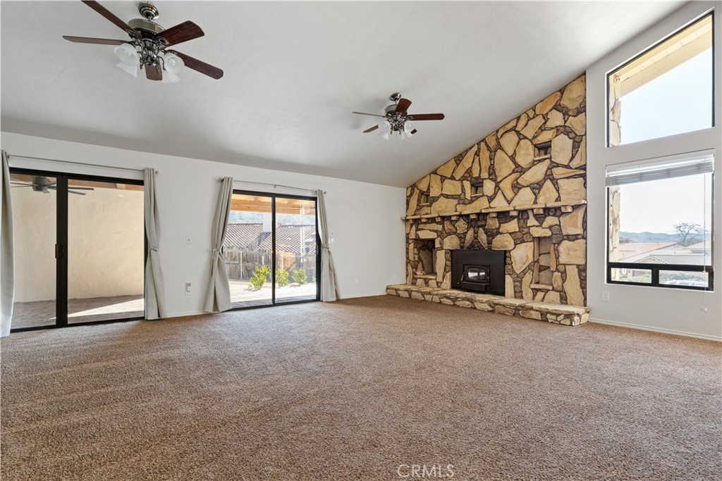 1670 Southfork Place Paso Robles, CA 93446 - Photo 23 of 61 an empty room with windows and fireplace