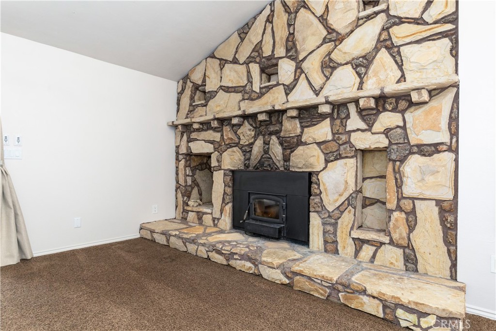 1670 Southfork Place Paso Robles, CA 93446 - Photo 25 of 61 a living room with a fireplace