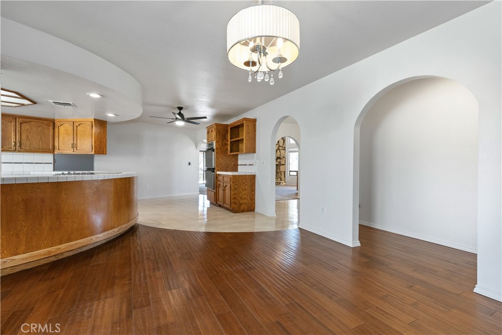 1670 Southfork Place Paso Robles, CA 93446 - Photo 35 of 61 a view of a kitchen with wooden floor and a ceiling fan