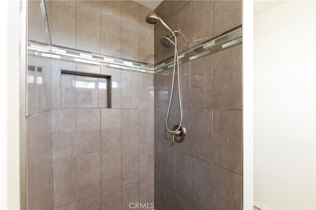 1670 Southfork Place Paso Robles, CA 93446 - Photo 50 of 61 a bathroom with a glass shower door
