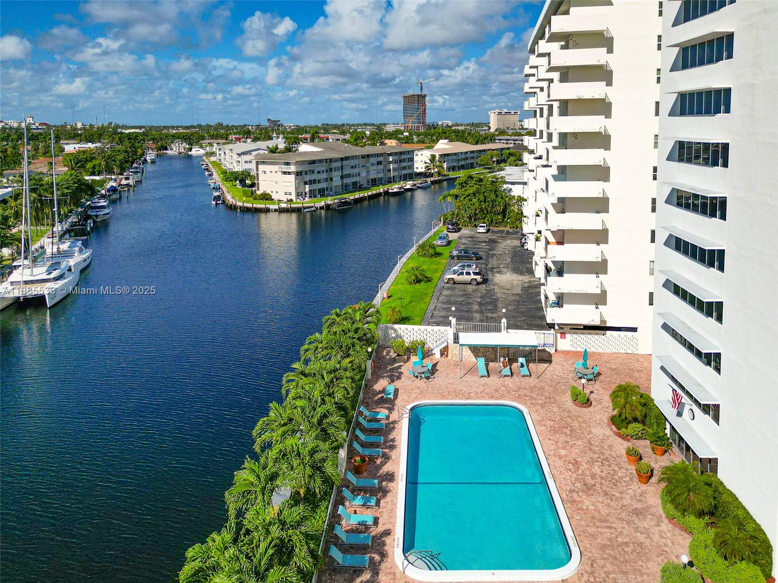 401 Golden Isles Drive, Unit 908 Hallandale Beach, FL 33009 - Photo 12 of 23 an aerial view of a house with a lake view