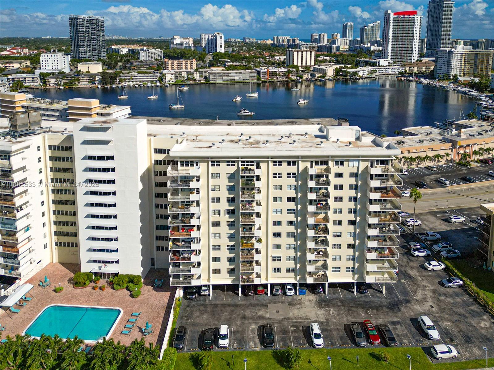 401 Golden Isles Drive, Unit 908 Hallandale Beach, FL 33009 - Photo 19 of 23 a picture of a city that has tall buildings