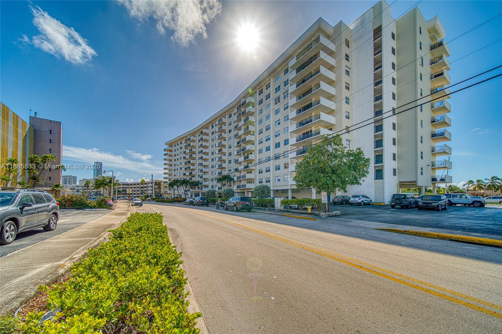 401 Golden Isles Drive, Unit 908 Hallandale Beach, FL 33009 - Photo 2 of 23 a view of a building
