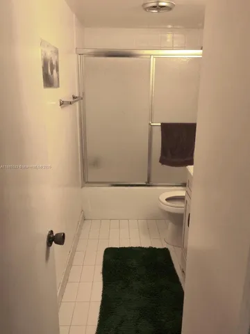 a bathroom with a sink and a shower
