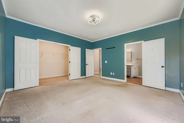 a view of a room with a large window