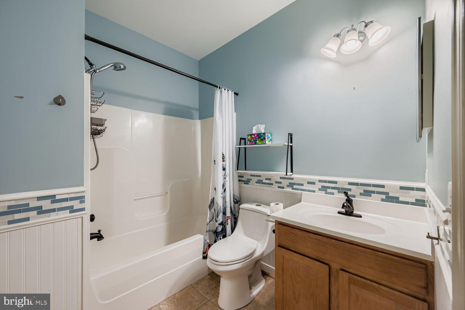 1250 Breitwert Avenue Odenton, MD 21113 - Photo 20 of 32 a bathroom with a sink toilet and shower