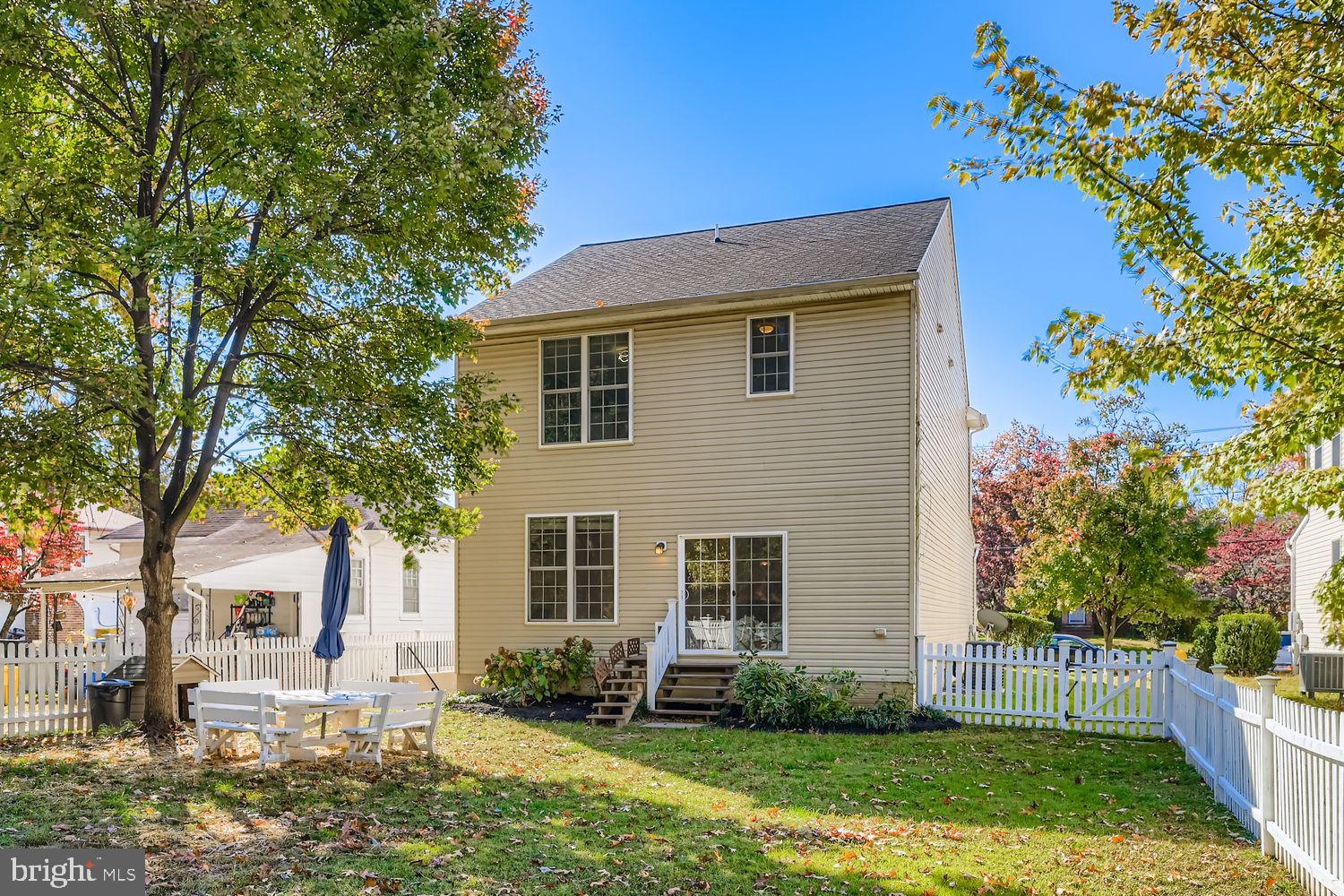 1250 Breitwert Avenue Odenton, MD 21113 - Photo 28 of 32 a front view of a house with a yard