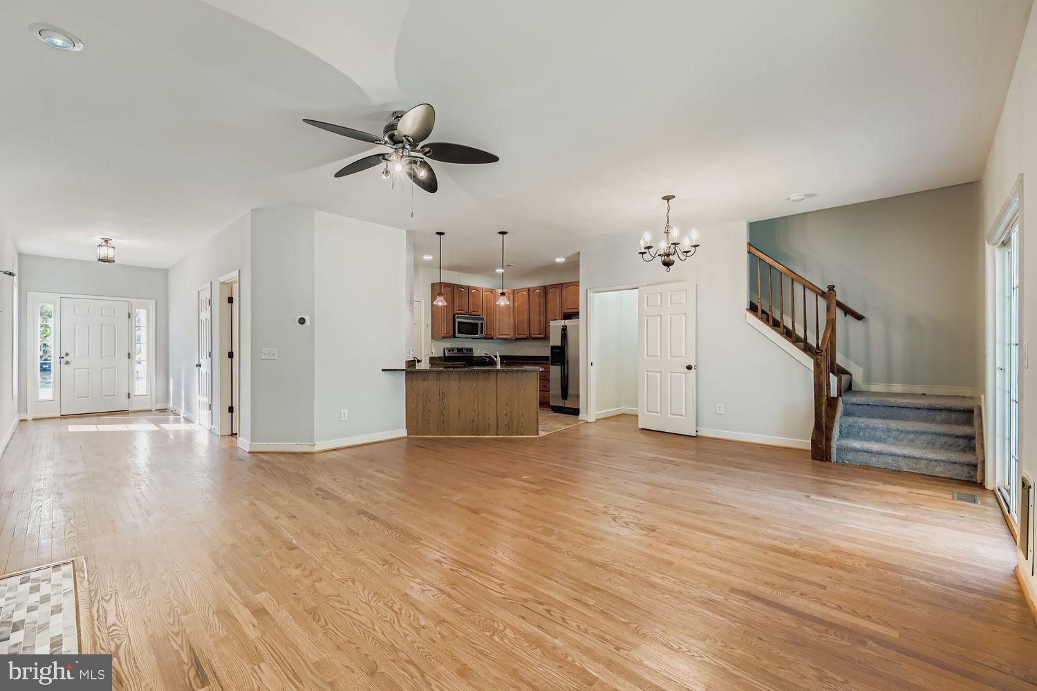 1250 Breitwert Avenue Odenton, MD 21113 - Photo 6 of 32 a view of empty room with wooden floor and window