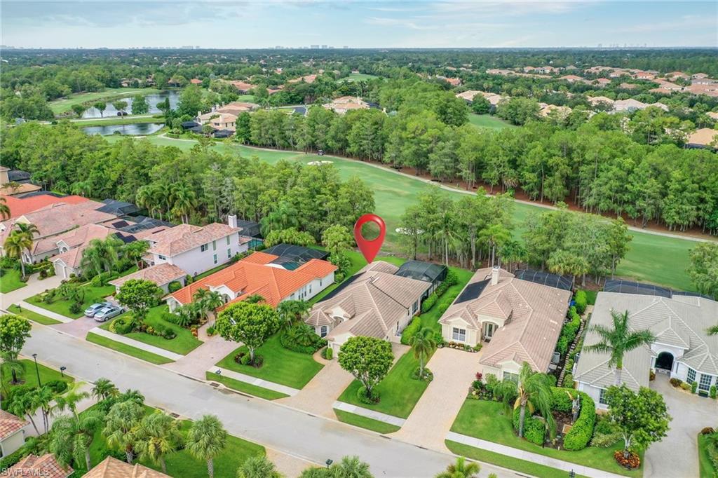2885 Lone Pine Lane Naples, FL 34119 - Photo 22 of 29 an aerial view of residential houses with outdoor space and street view
