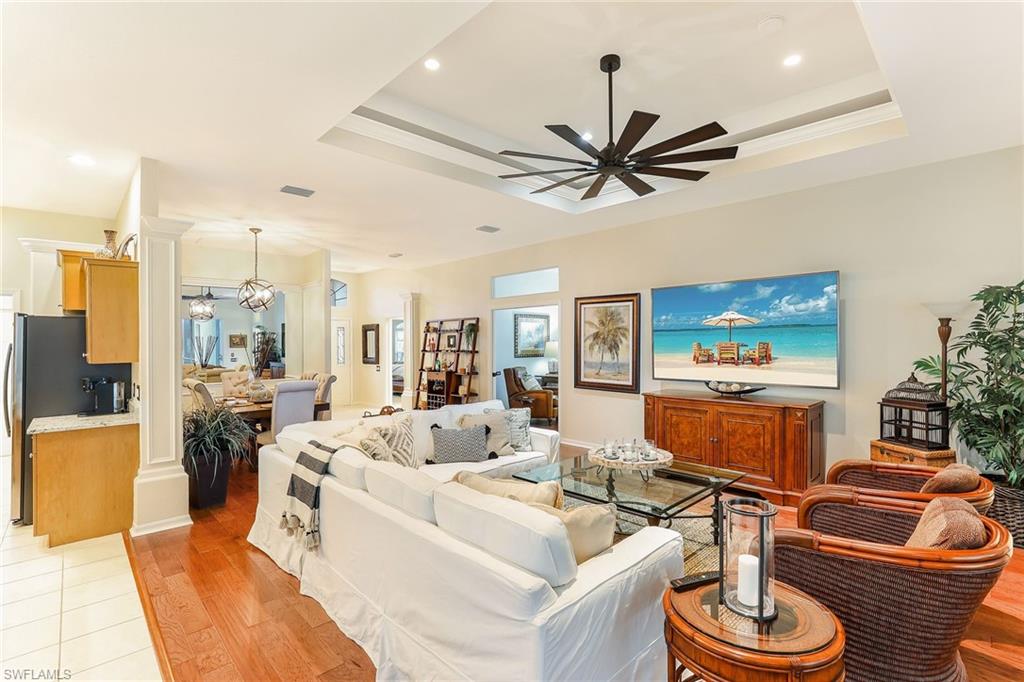2885 Lone Pine Lane Naples, FL 34119 - Photo 3 of 29 a living room with furniture and a large window