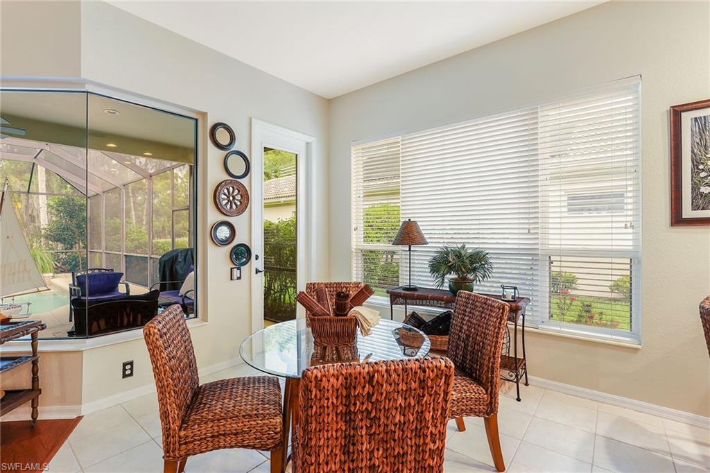 2885 Lone Pine Lane Naples, FL 34119 - Photo 9 of 29 a living room with furniture and a window