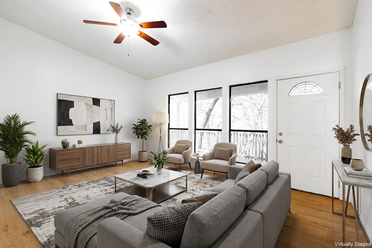 706 Ramble Lane, Unit B Austin, TX 78745 - Photo 3 of 12 a living room with furniture ceiling fan and a window