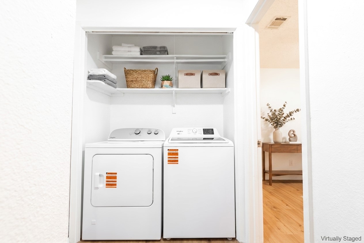 706 Ramble Lane, Unit B Austin, TX 78745 - Photo 7 of 12 a utility room with dryer and washer