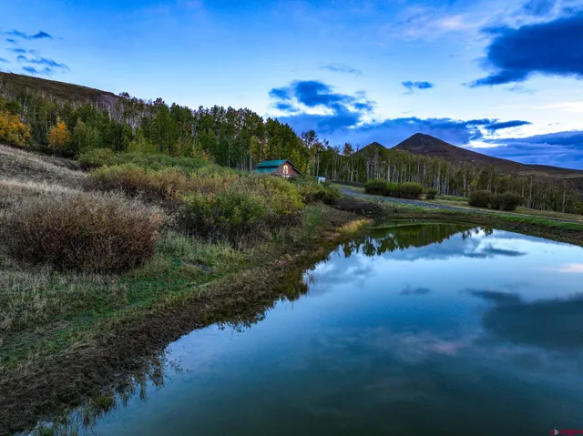 a view of a lake in middle of the town