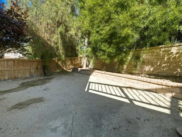 a view of a garden with a bench