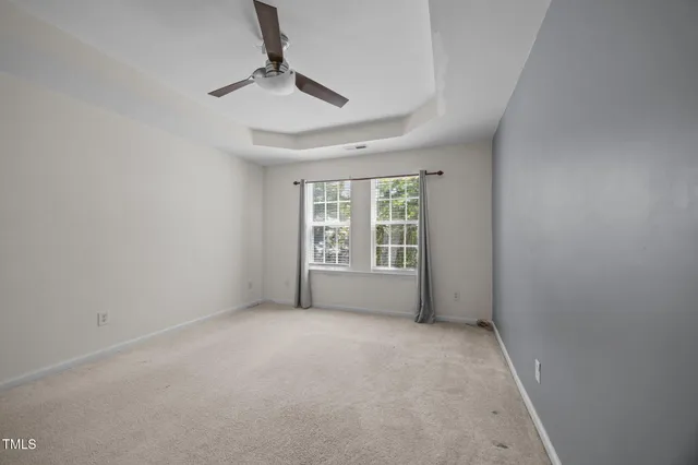 a kitchen with stainless steel appliances granite countertop a refrigerator stove top oven and sink