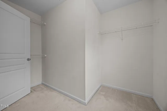 a bathroom with a sink toilet and a mirror