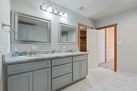 a big yard with large trees