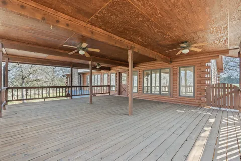 a view of a room with a large window