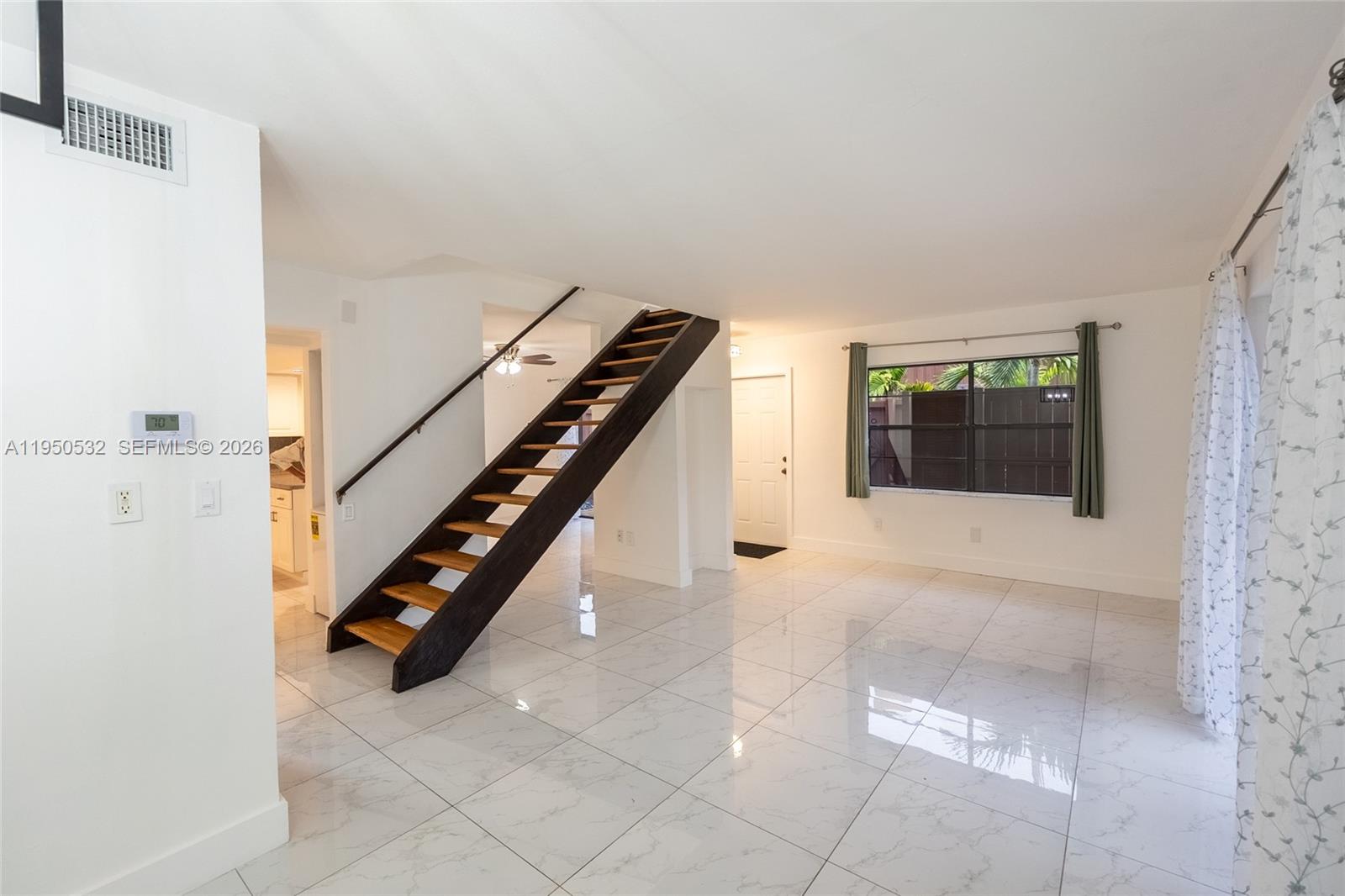 6534 Southwest 114th Place, Unit G75 Miami, FL 33173 - Photo 12 of 52 a view of entryway and hall