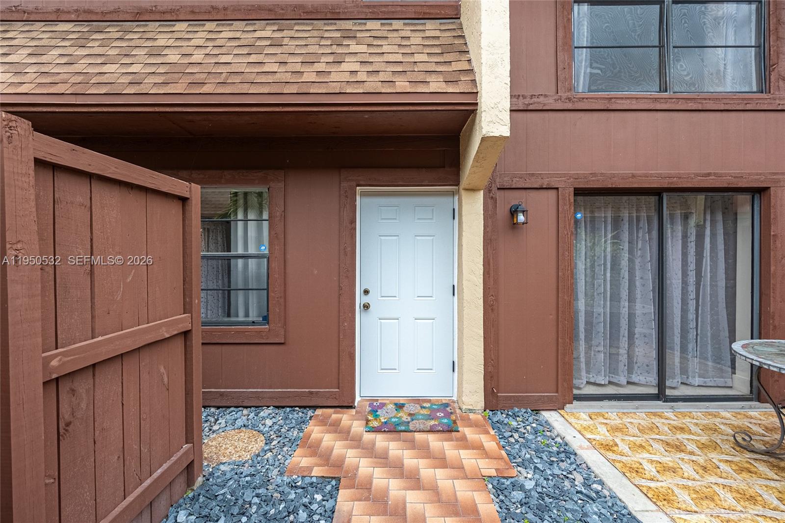 6534 Southwest 114th Place, Unit G75 Miami, FL 33173 - Photo 3 of 52 a view of an entryway door