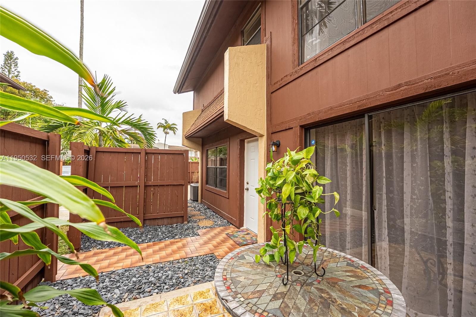 6534 Southwest 114th Place, Unit G75 Miami, FL 33173 - Photo 4 of 52 2 0f 3 Front patio