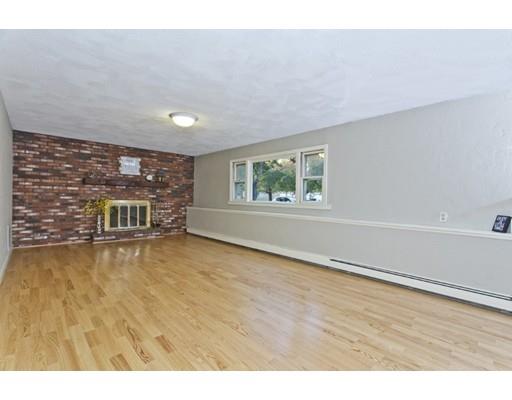 8 Rustic Lane Reading, MA 01867 - Photo 25 of 29 a view of an empty room with a window