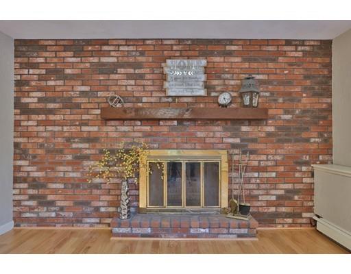 8 Rustic Lane Reading, MA 01867 - Photo 26 of 29 a black and white photo of a house