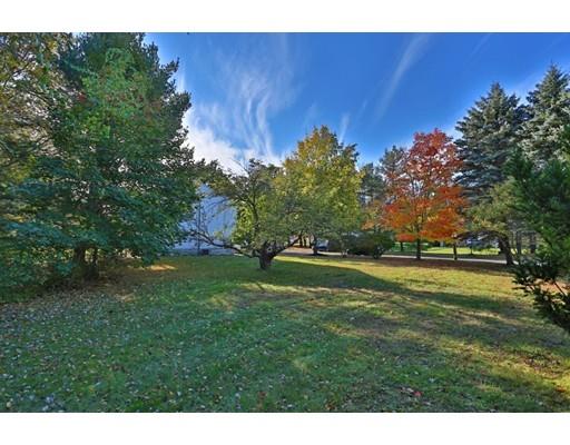 8 Rustic Lane Reading, MA 01867 - Photo 4 of 29 a view of a golf course with a house