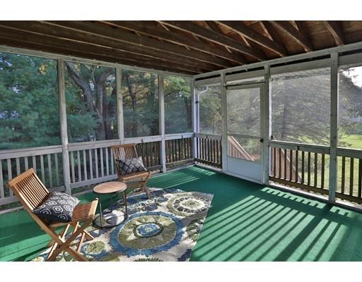 8 Rustic Lane Reading, MA 01867 - Photo 7 of 29 a view of a deck with wooden floor and outdoor seating