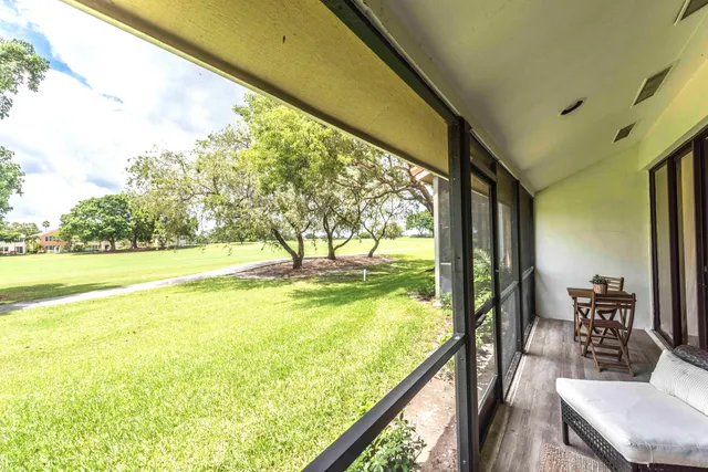 a view of swimming pool from a yard