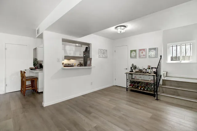 a bedroom with a large bed and closet