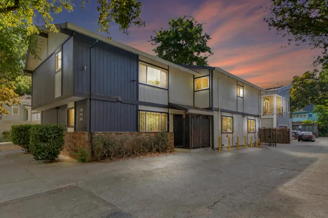 a view of a house with a street
