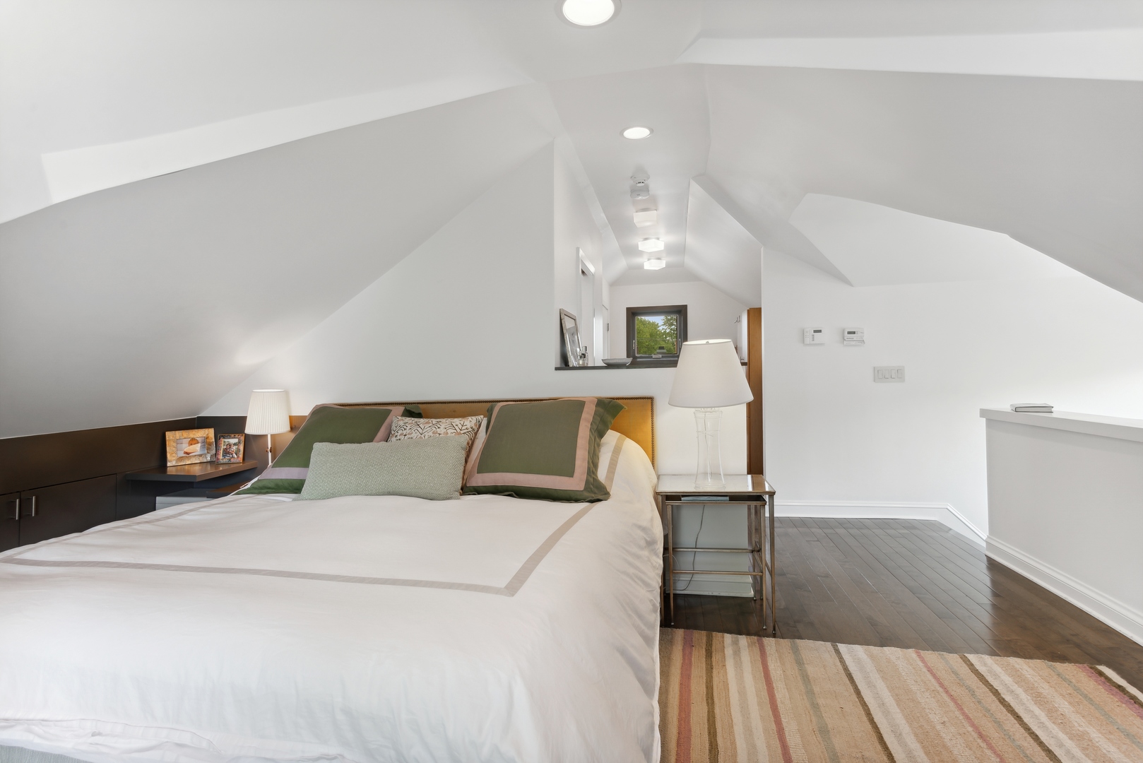 1465 West Cullom Avenue Chicago, IL 60613 - Photo 21 of 54 a bed room with two bed and a night stand