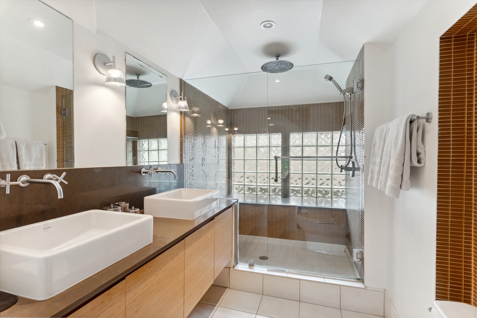 1465 West Cullom Avenue Chicago, IL 60613 - Photo 23 of 54 a bathroom with a tub sink and mirror