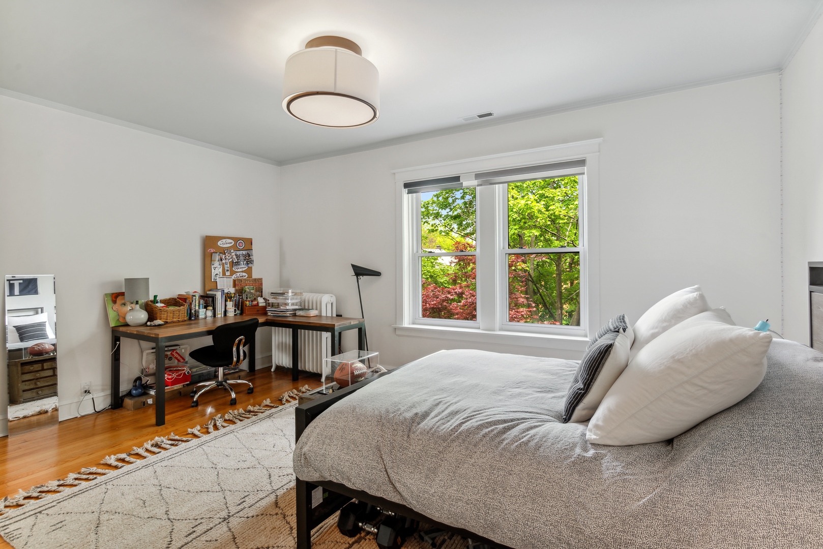 1465 West Cullom Avenue Chicago, IL 60613 - Photo 28 of 54 a bed room with a bed and a desk