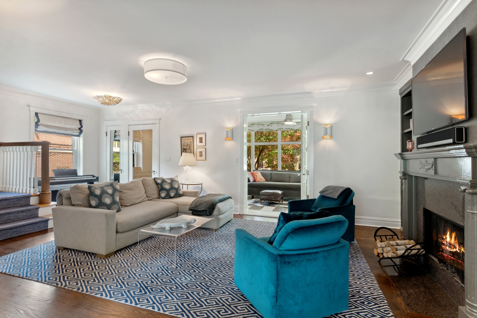 1465 West Cullom Avenue Chicago, IL 60613 - Photo 7 of 54 a living room with furniture a fireplace and a flat screen tv