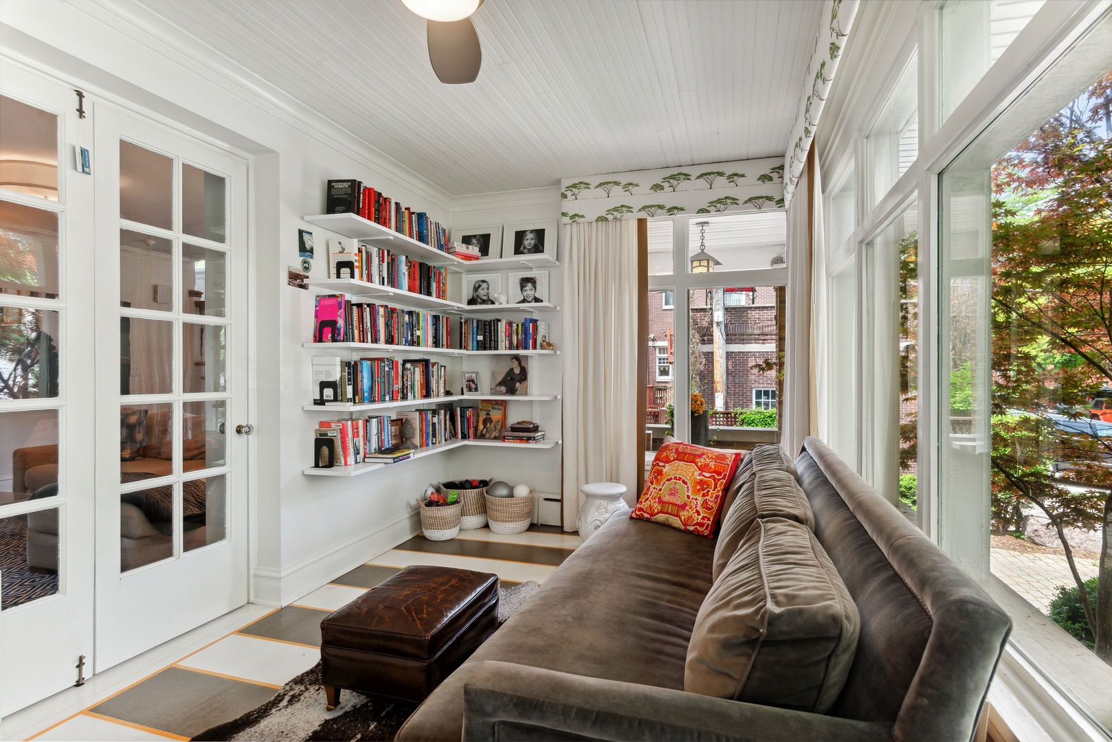 1465 West Cullom Avenue Chicago, IL 60613 - Photo 10 of 54 a living room with furniture and a book shelf