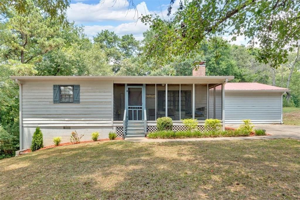122 Atkins Drive Southeast Rome, GA 30161 - Photo 1 of 1 front view of house with a yard