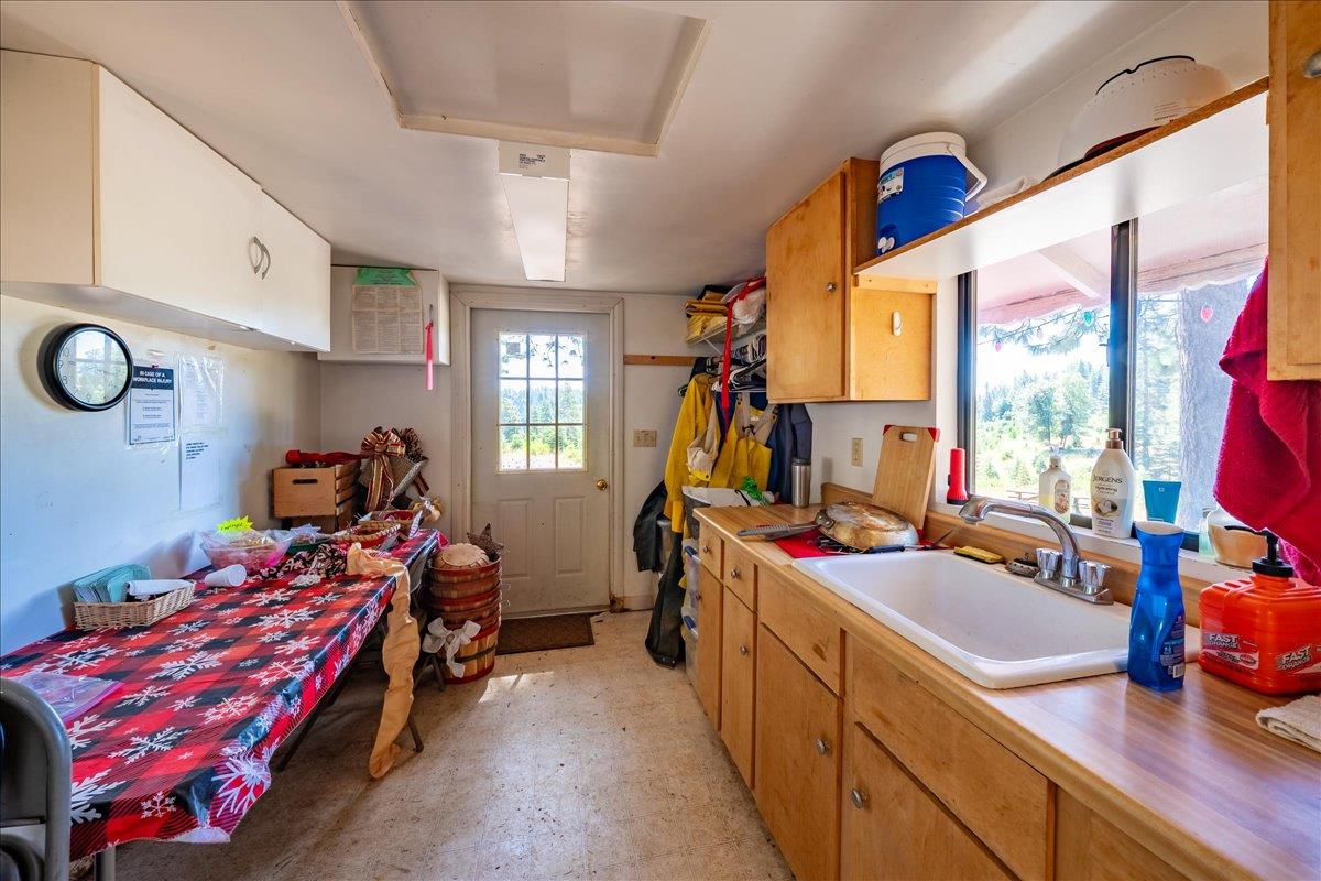 30100 Foresthill Road Foresthill, CA 95631 - Photo 11 of 89 a bedroom with bed and a large window