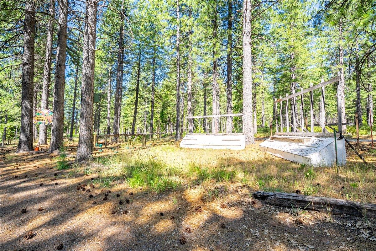 30100 Foresthill Road Foresthill, CA 95631 - Photo 61 of 89 a swimming pool with outdoor seating and yard